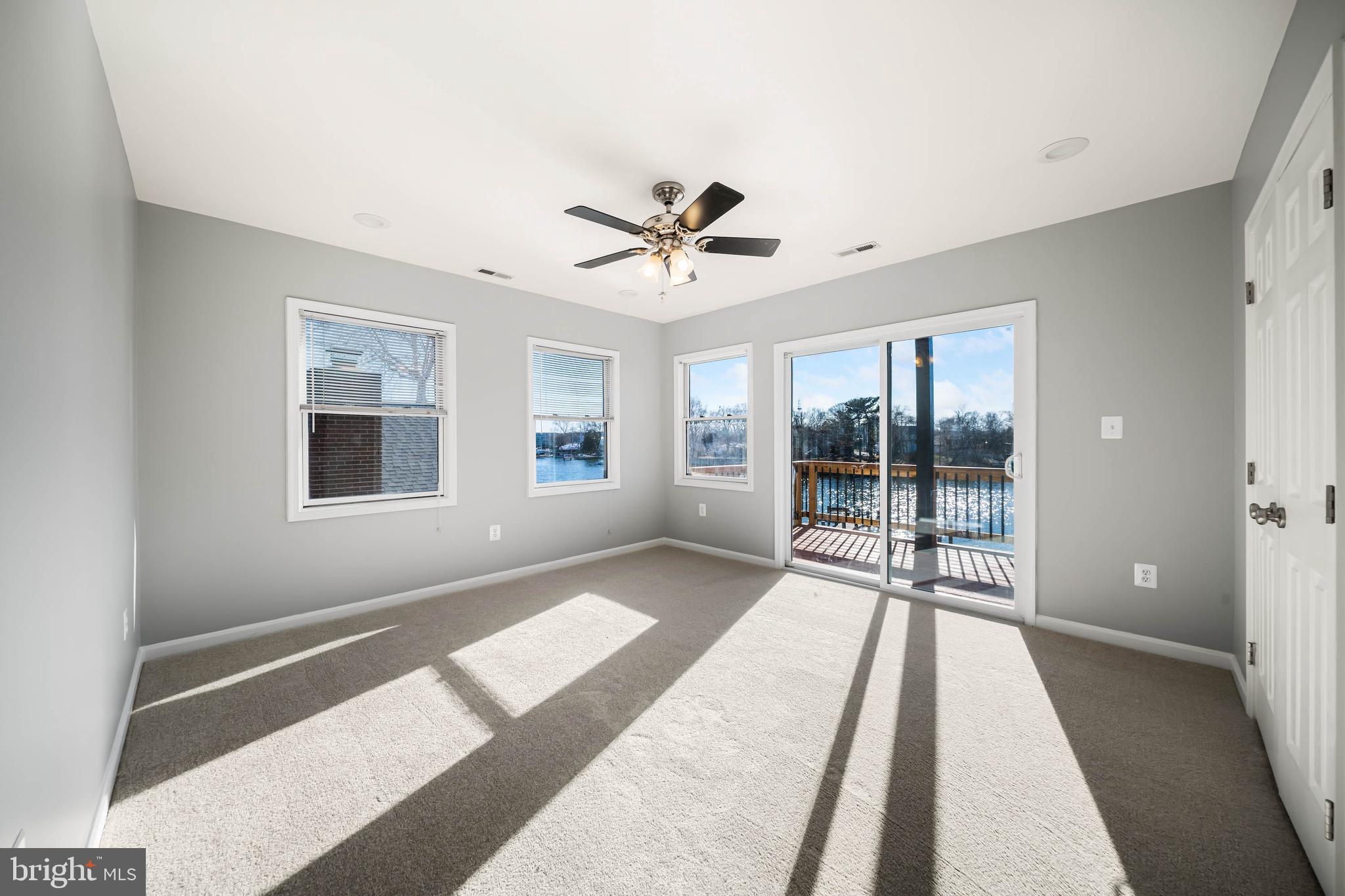8101 Shore Road Baltimore, MD 21222 - Photo 20 of 35 a view of a room with a ceiling fan and window