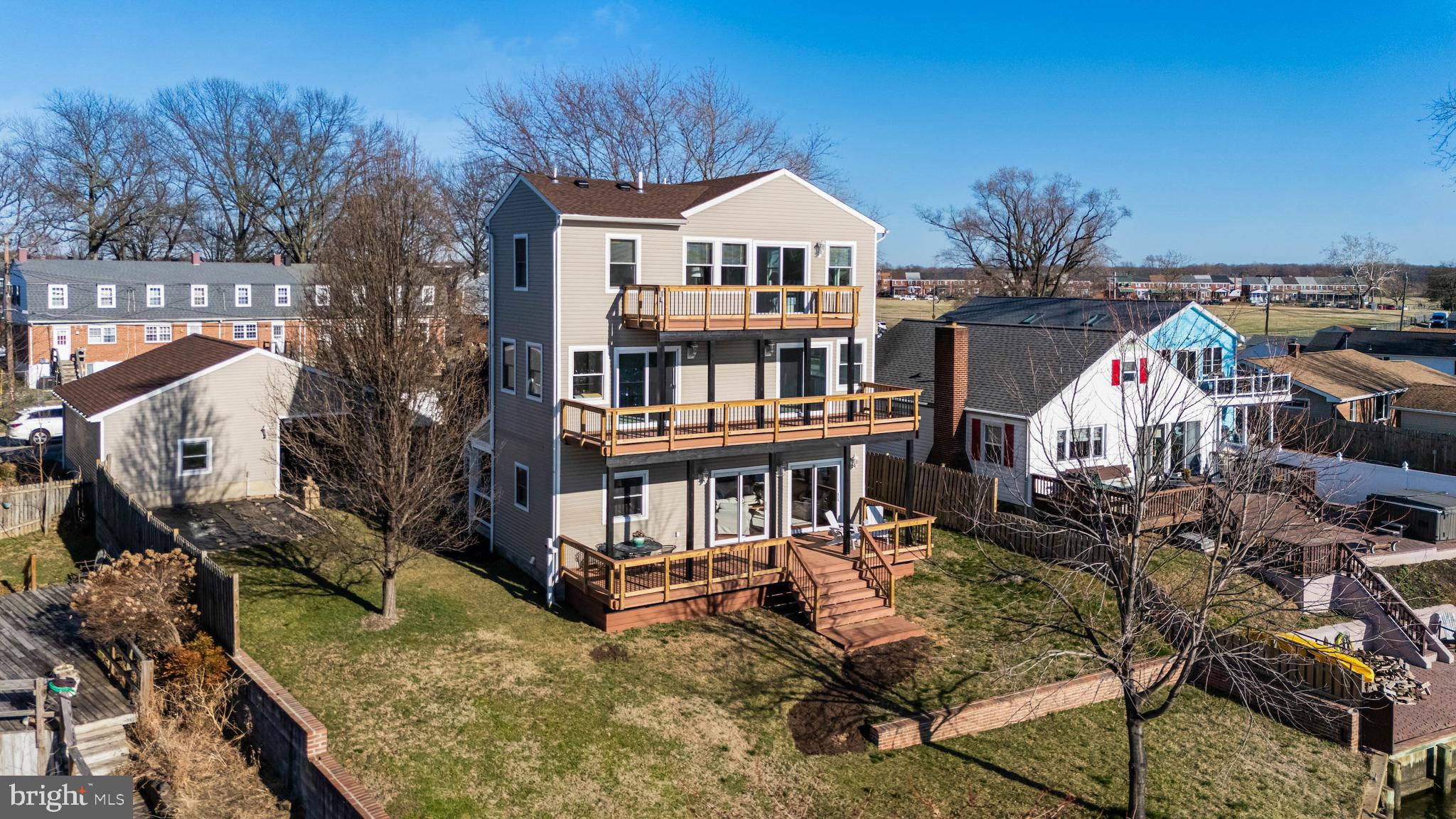 8101 Shore Road Baltimore, MD 21222 - Photo 2 of 35 a view of a big yard with plants and large trees