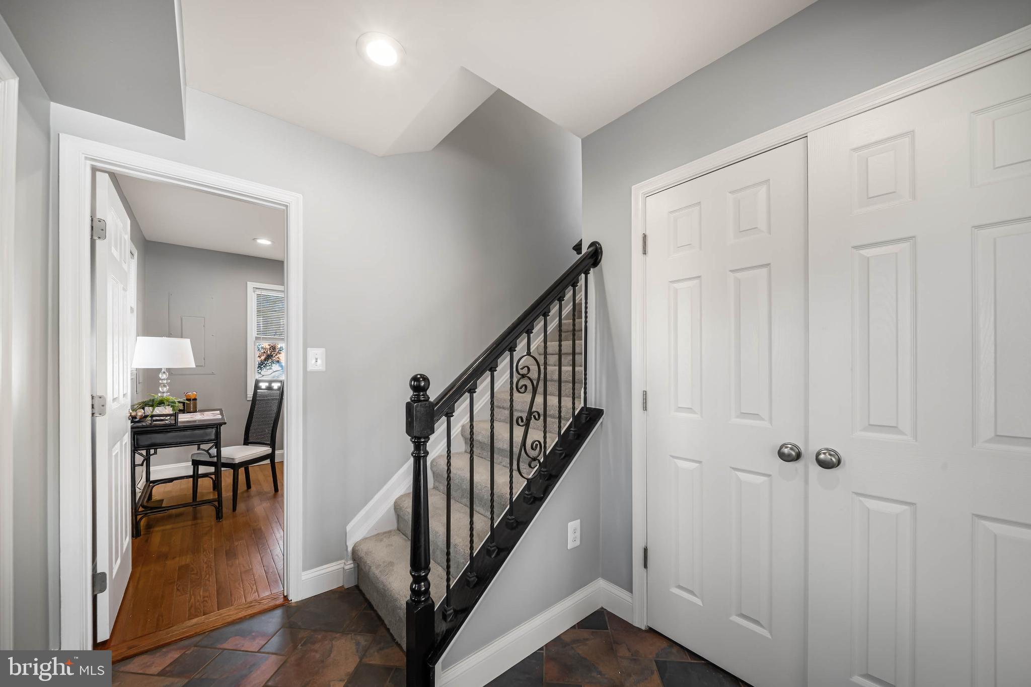 8101 Shore Road Baltimore, MD 21222 - Photo 24 of 35 a view of a hallway with dining room and stairs