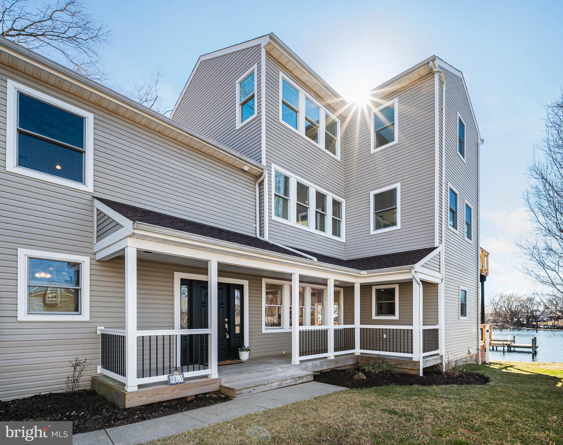 8101 Shore Road Baltimore, MD 21222 - Photo 34 of 35 a front view of a house with a yard