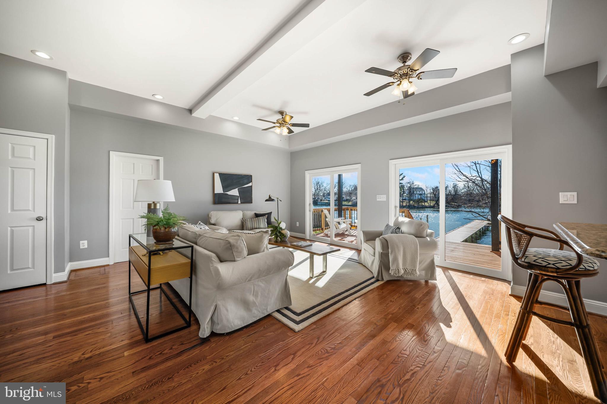8101 Shore Road Baltimore, MD 21222 - Photo 6 of 35 a living room with furniture and a wooden floor
