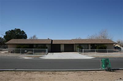16503 Smoke Tree Street Hesperia, CA 92345 - Photo 1 of 1 a view of house with a yard