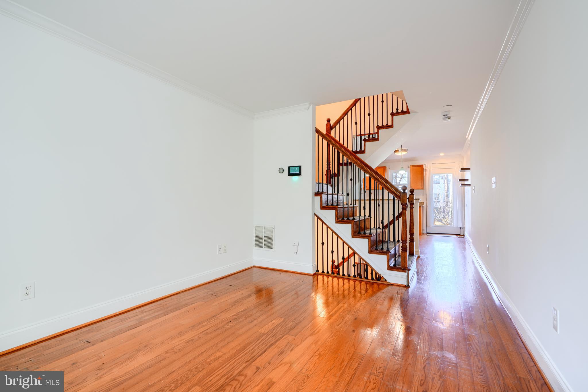 1520 Byrd Street Baltimore, MD 21230 - Photo 4 of 36 a view of entryway with wooden floor