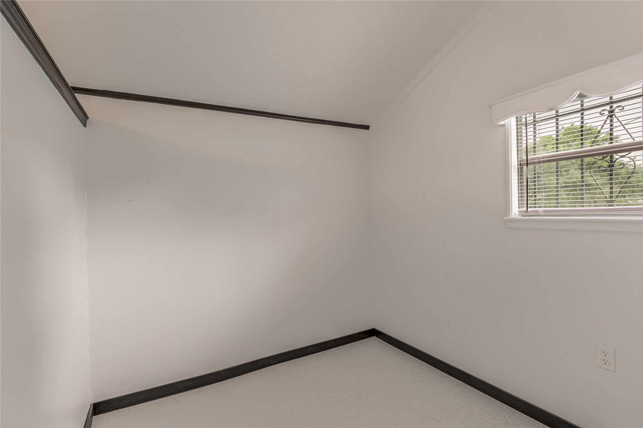 128 Johnnie Street Trinity, TX 75862 - Photo 13 of 19 a small space with a window