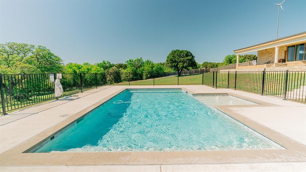 175 Tobacco Road Whitney, TX 76692 - Photo 30 of 35 View of pool with a patio area and view of scattered trees