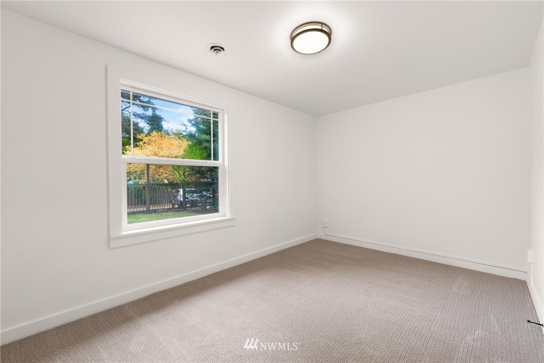 11519 32nd Avenue Northeast Seattle, WA 98125 - Photo 13 of 17 an empty room with window