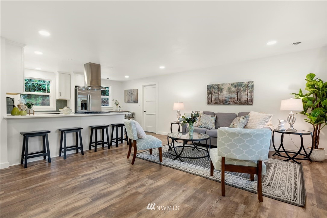 11519 32nd Avenue Northeast Seattle, WA 98125 - Photo 5 of 17 a living room with furniture and a wooden floor