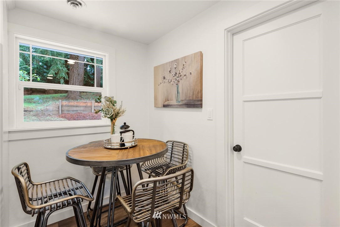 11519 32nd Avenue Northeast Seattle, WA 98125 - Photo 10 of 17 a dining room with furniture and window