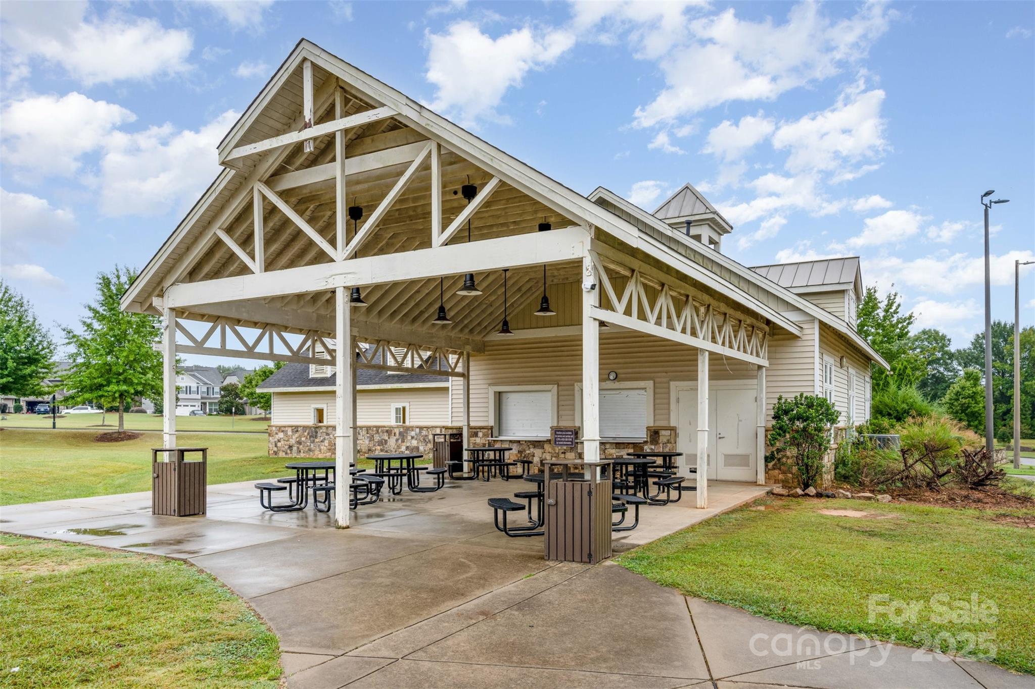 6883 Spring Peeper Lane Lancaster, SC 29720 - Photo 36 of 42 a view of a house with backyard porch and sitting area