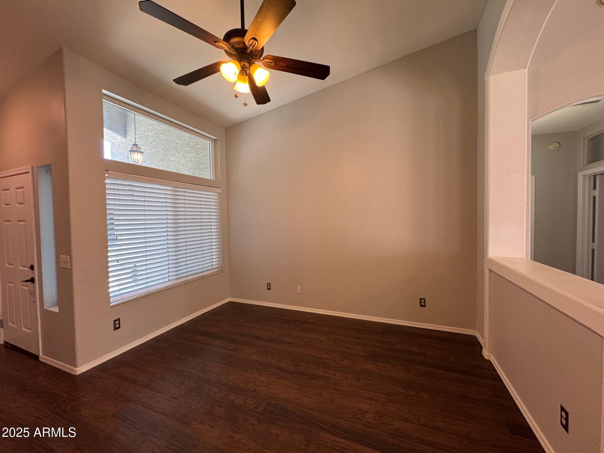 1822 South 39th Street, Unit 6 Mesa, AZ 85206 - Photo 8 of 18 wooden floor in an empty room with a window