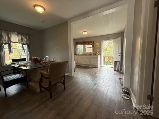 a workspace with furniture hardwood and a window