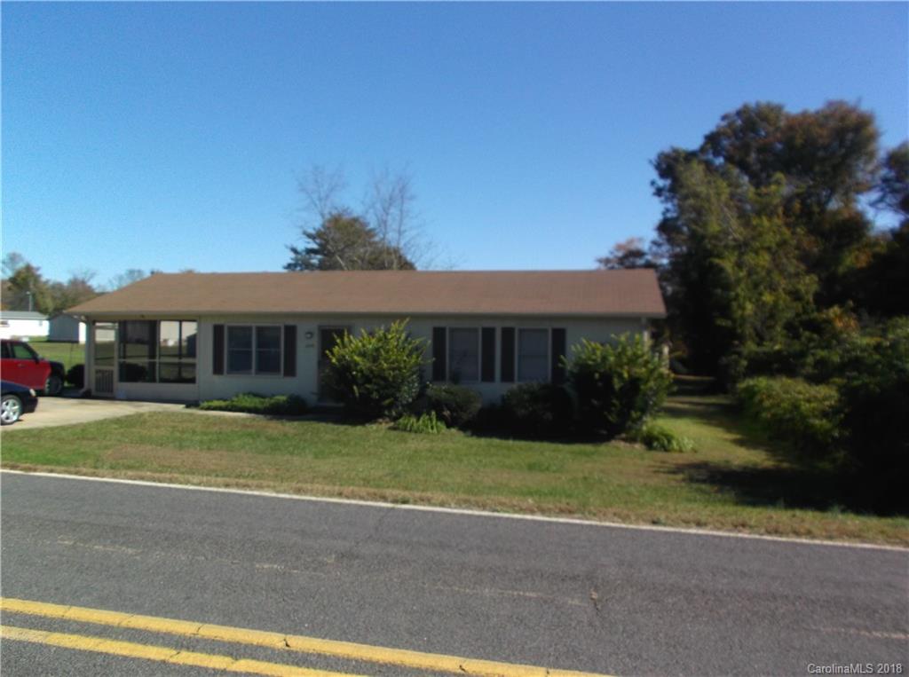 1835 Rainey Road Salisbury, NC 28146 - Photo 1 of 17 a view of a big house with a big yard and palm trees
