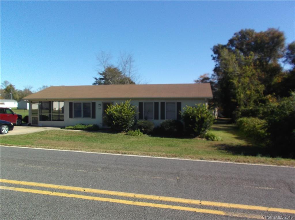 1835 Rainey Road Salisbury, NC 28146 - Photo 2 of 17 a front view of a house with a garden