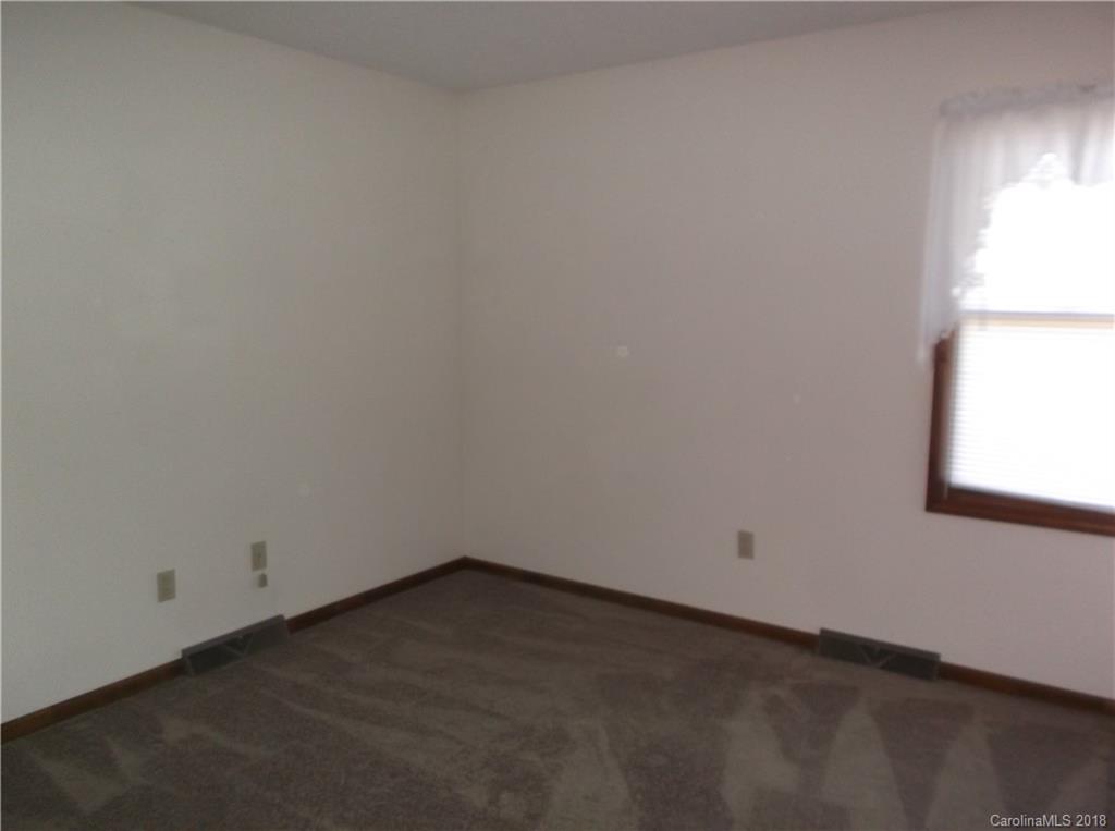 1835 Rainey Road Salisbury, NC 28146 - Photo 14 of 17 an empty room with a window