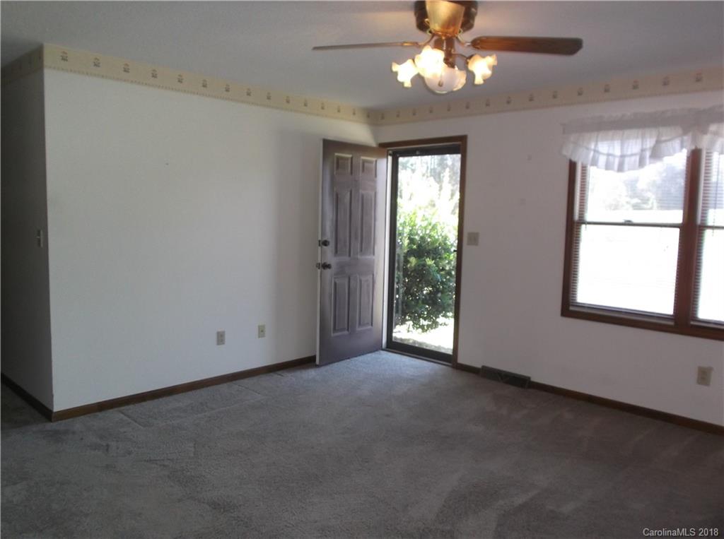 1835 Rainey Road Salisbury, NC 28146 - Photo 5 of 17 a view of an empty room with a window