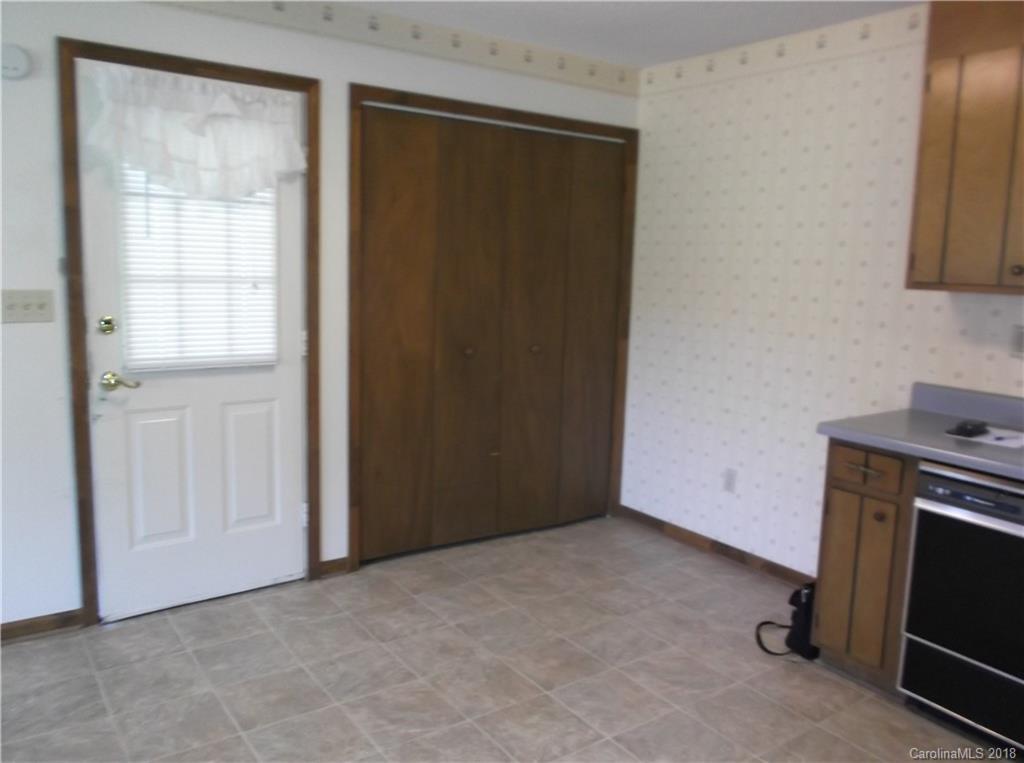 1835 Rainey Road Salisbury, NC 28146 - Photo 9 of 17 a view of an empty room with a fireplace