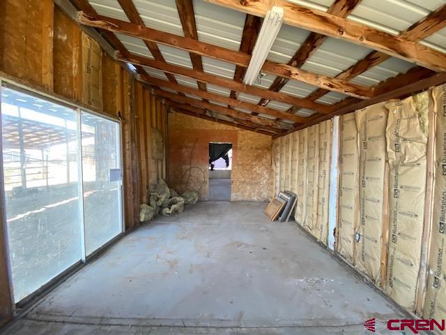 24502 Rd North Cortez, CO 81321 - Photo 21 of 35 a view of empty room with wooden walls