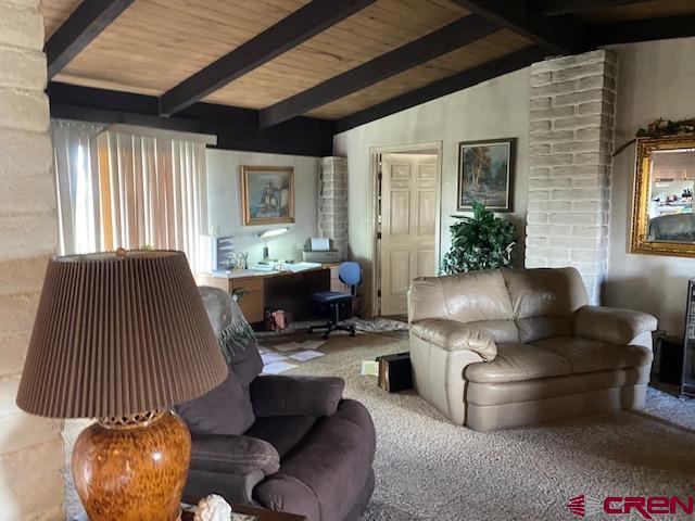 24502 Rd North Cortez, CO 81321 - Photo 8 of 35 a living room with furniture and a large window