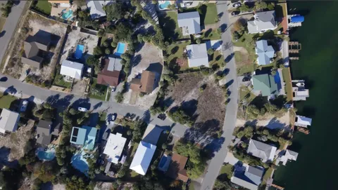 an aerial view of house with yard