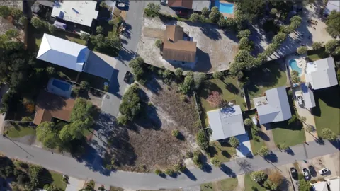 an aerial view of house with yard