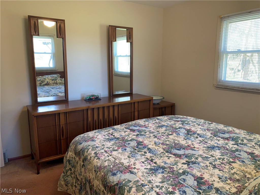 4789 West Bath Road Akron, OH 44333 - Photo 20 of 27 Bedroom 2nd view. Wood floors under the carpet.