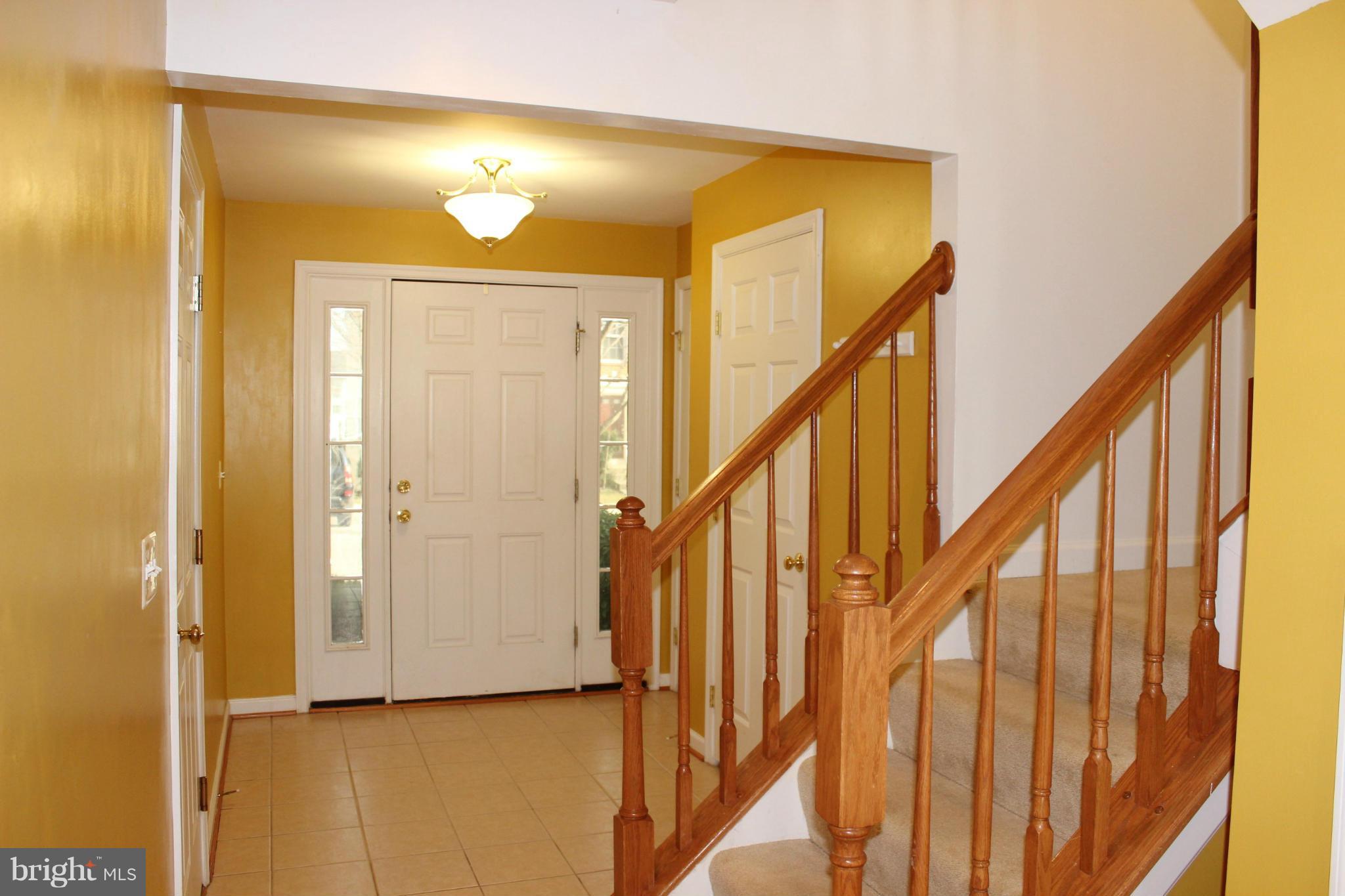 1319 Steed Street Ranson, WV 25438 - Photo 3 of 22 a view of an entryway with wooden floor