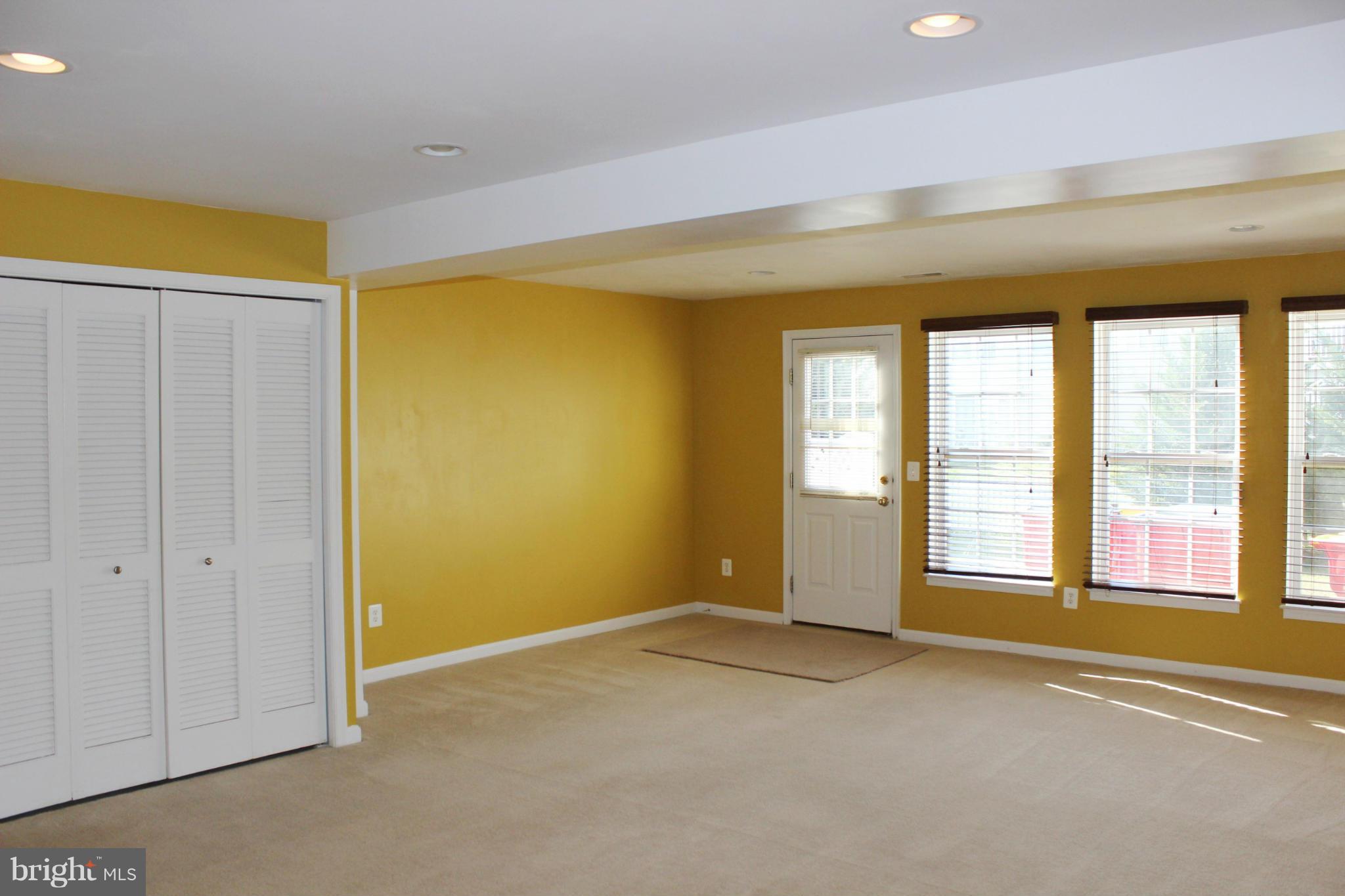 1319 Steed Street Ranson, WV 25438 - Photo 5 of 22 a view of an empty room with a window