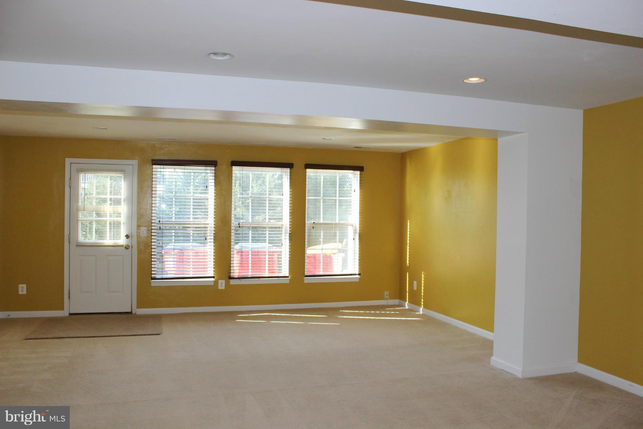 1319 Steed Street Ranson, WV 25438 - Photo 6 of 22 a view of an empty room with a window