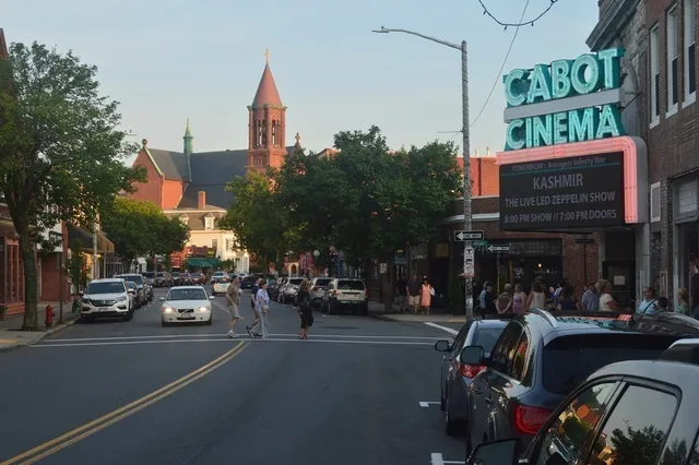 a view of a lake with houses in the back