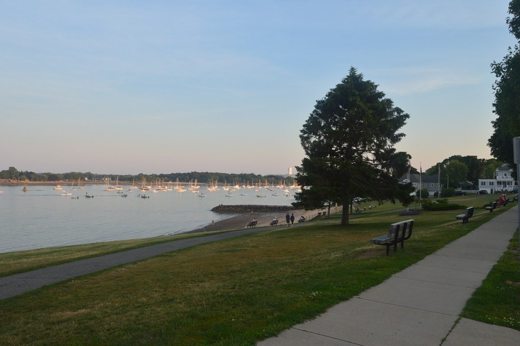 5 West Dane Street, Unit 7 Beverly, MA 01915 - Photo 13 of 14 a view of a lake with houses in the back