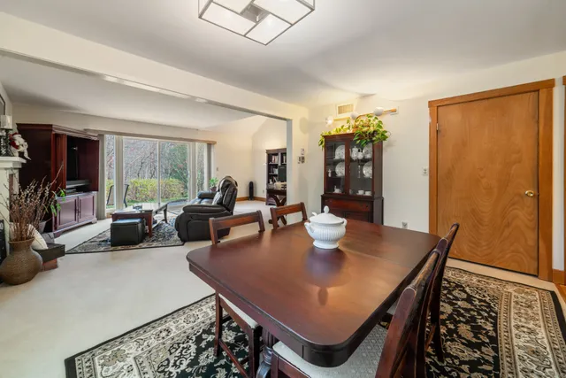 a view of a dining room with furniture