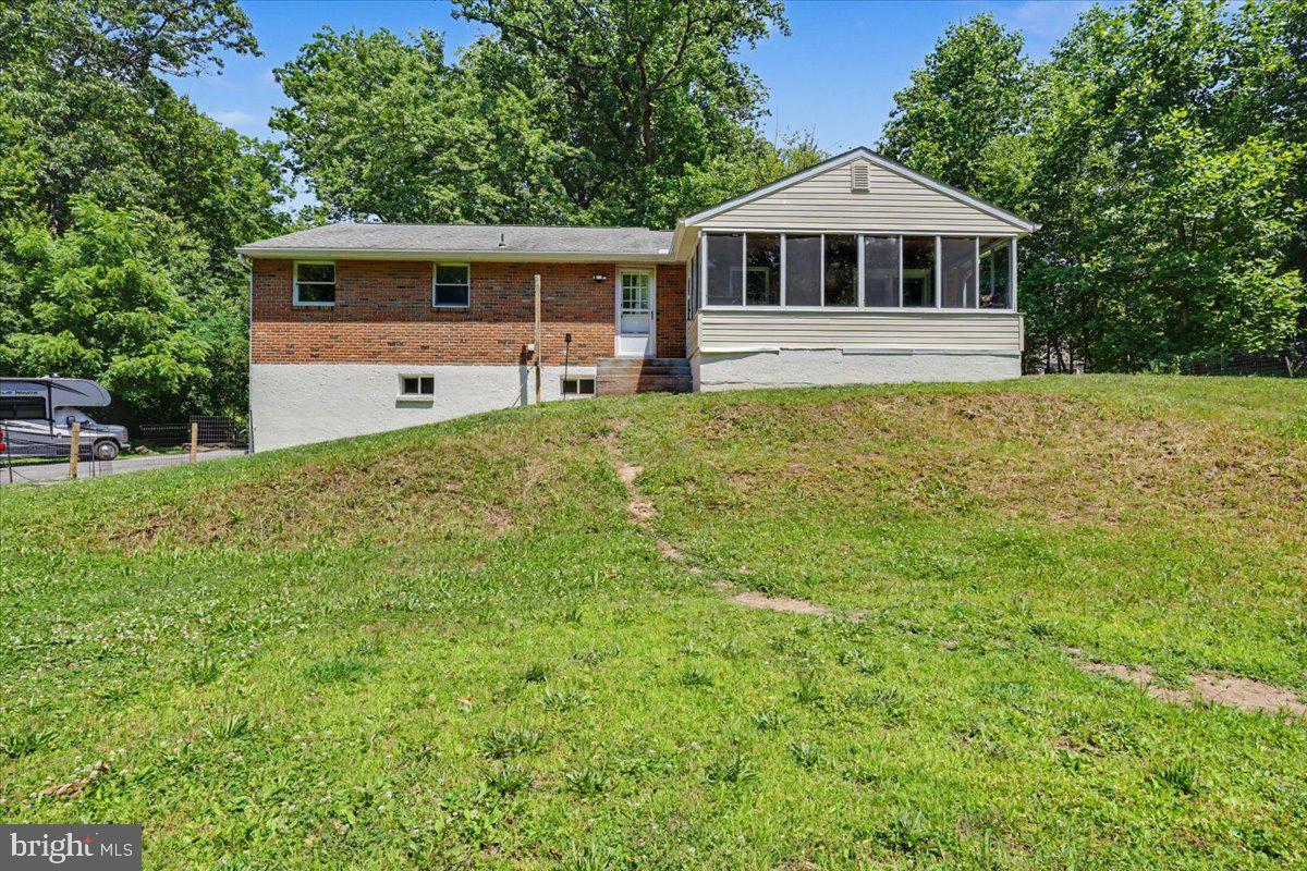 1199 Shenkel Road Pottstown, PA 19465 - Photo 5 of 38 Rear of property with enclosed porch