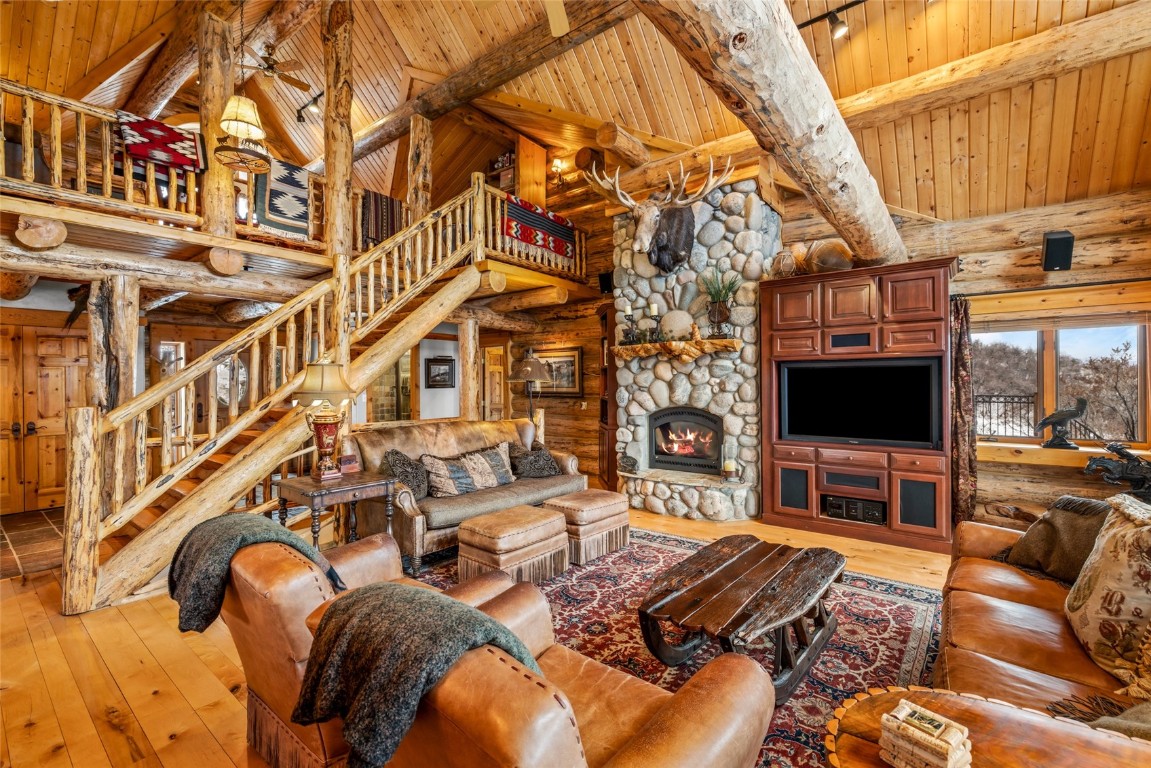 32790 Hidden Pond Path Steamboat Springs, CO 80487 - Photo 14 of 31 a view of a living room furniture and a flat screen tv