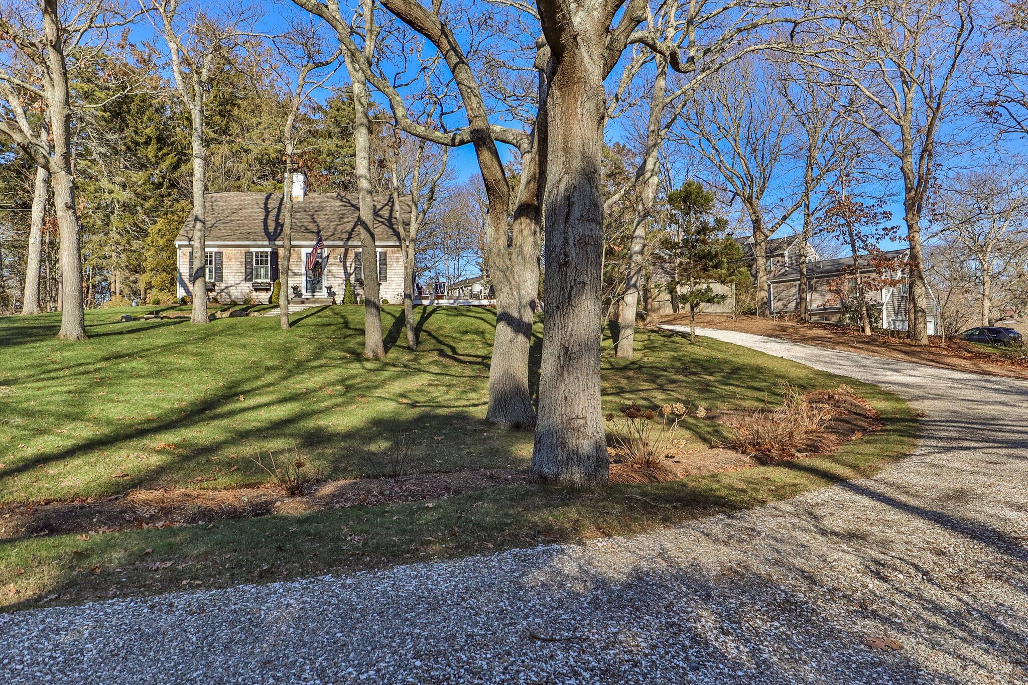 76 Headwaters Road Centerville, MA 02632 - Photo 3 of 53 driveway seashells and gravel