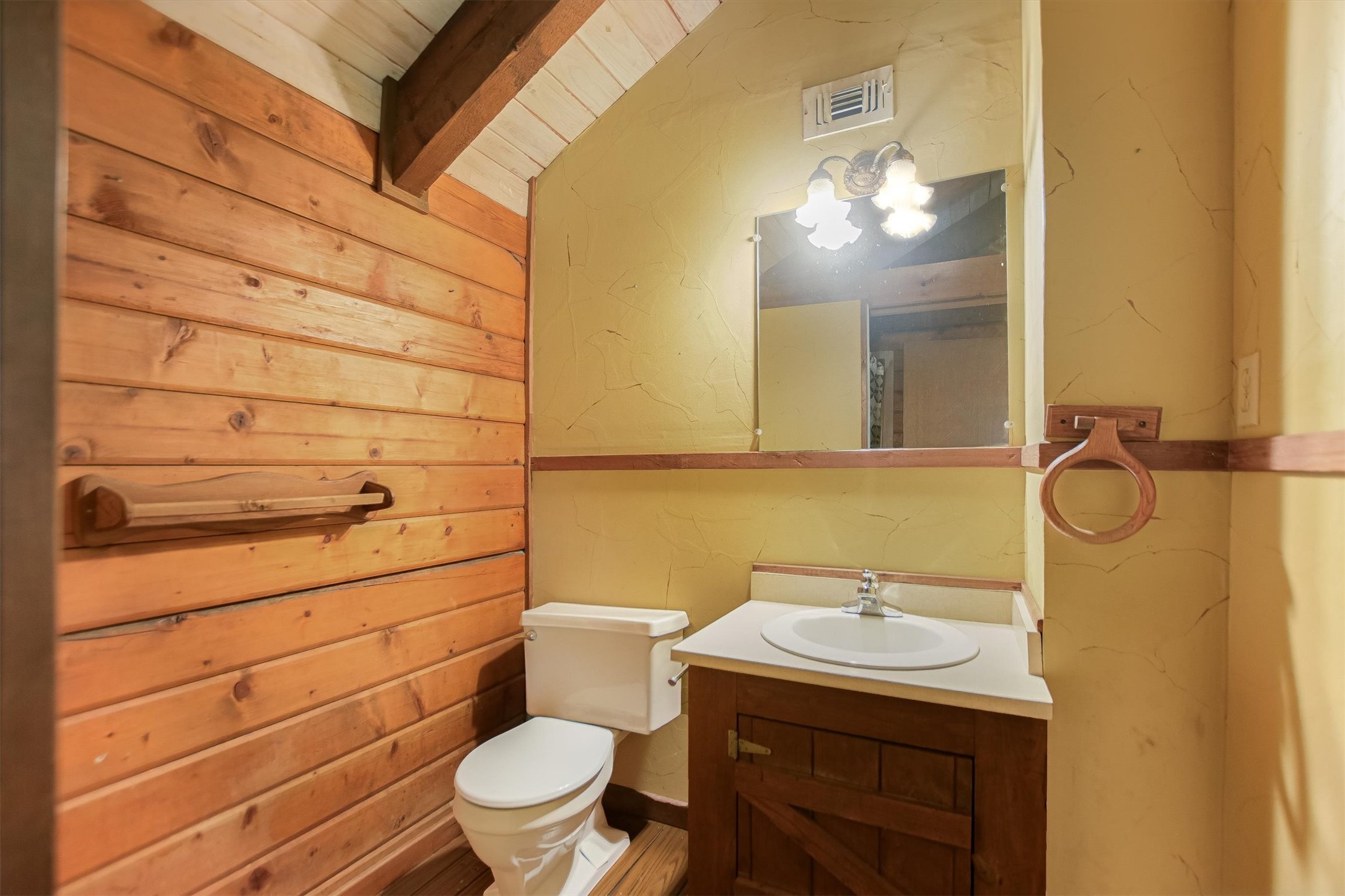 12711 Rr, Unit 12 Wimberley, TX 78676 - Photo 11 of 20 A full bathroom is located adjacent to the loft, serving the upstairs guest quarters