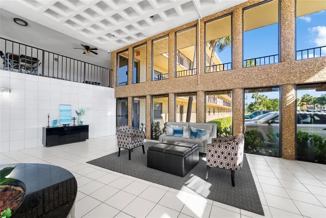 a view of a backyard with sitting area