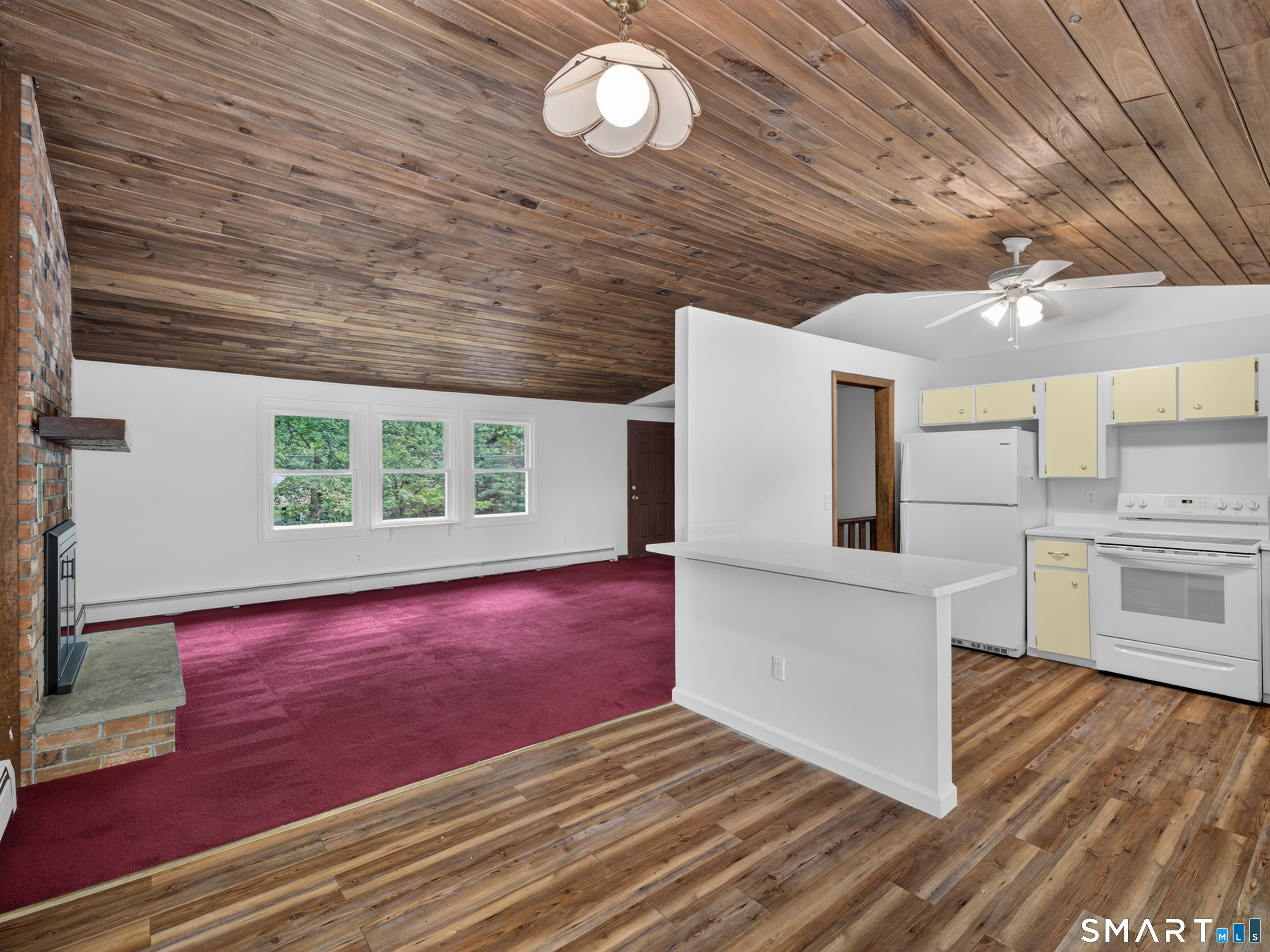 75 Airline Road Clinton, CT 06413 - Photo 12 of 37 a view of kitchen and wooden floor