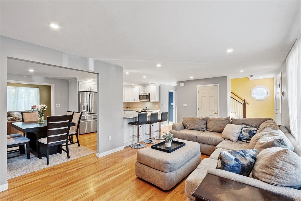 145 Virginia Road Waltham, MA 02453 - Photo 12 of 36 a living room with furniture and wooden floor