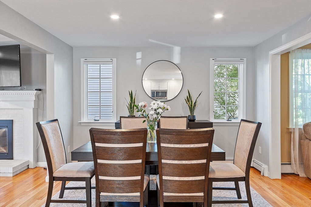 145 Virginia Road Waltham, MA 02453 - Photo 14 of 36 a view of a dining room with furniture window and wooden floor