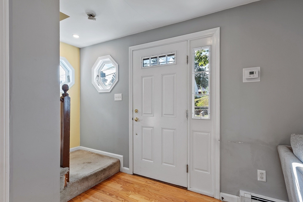 145 Virginia Road Waltham, MA 02453 - Photo 16 of 36 a view of room with window and hardwood floor