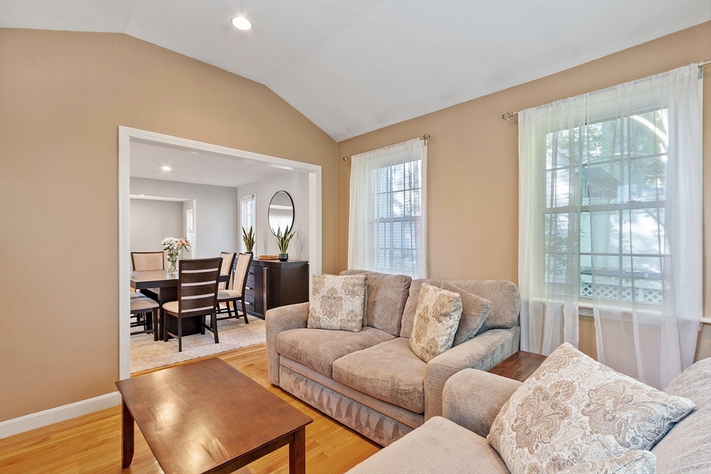 145 Virginia Road Waltham, MA 02453 - Photo 18 of 36 a living room with furniture and a large window