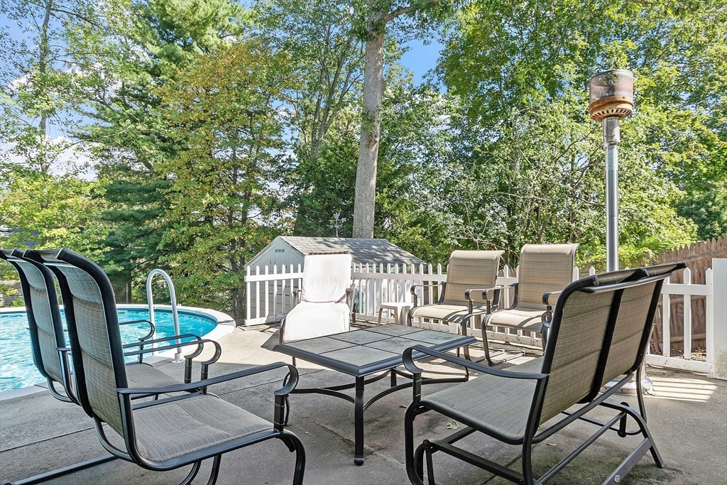 145 Virginia Road Waltham, MA 02453 - Photo 32 of 36 a view of a chairs and table in the roof deck