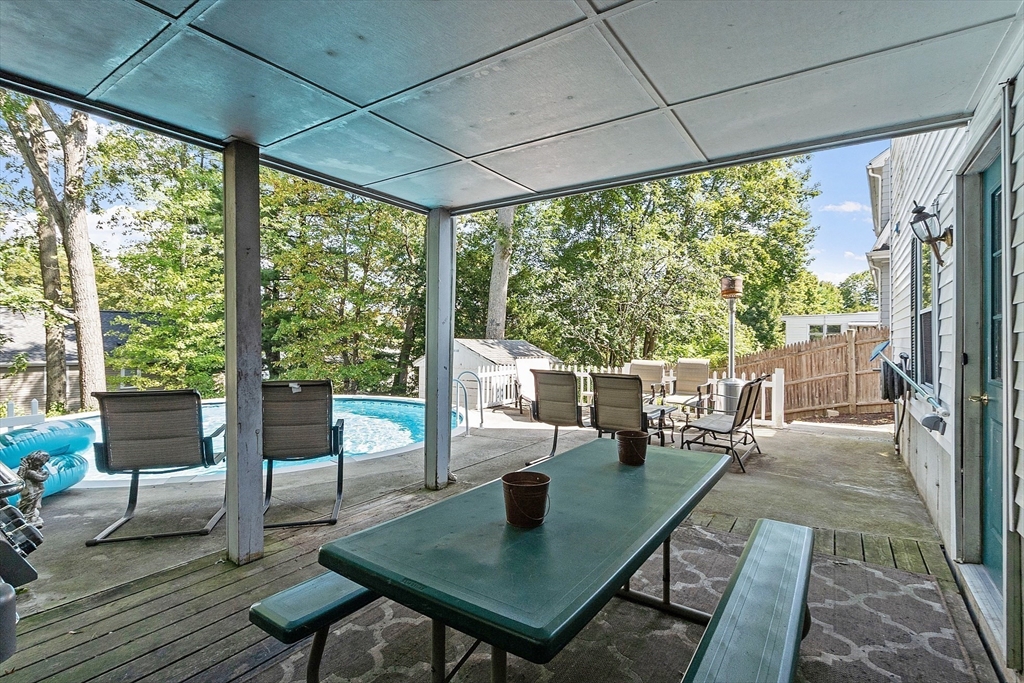 145 Virginia Road Waltham, MA 02453 - Photo 34 of 36 a living room with large windows