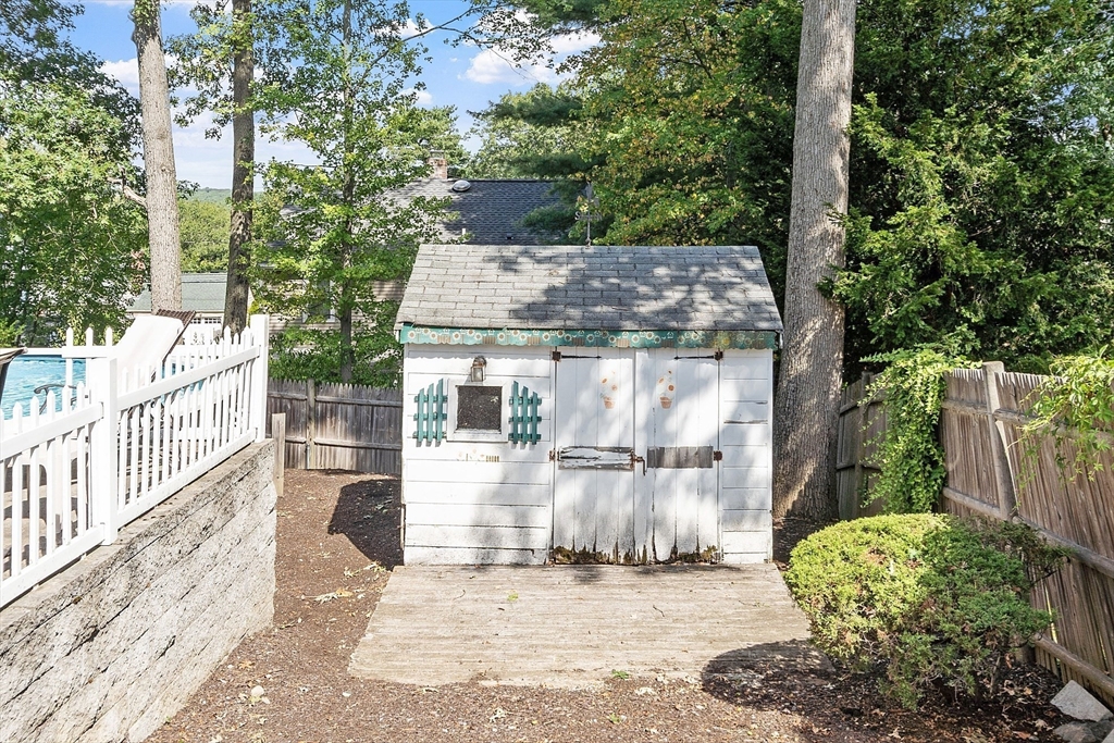 145 Virginia Road Waltham, MA 02453 - Photo 35 of 36 a view of a back yard of the house