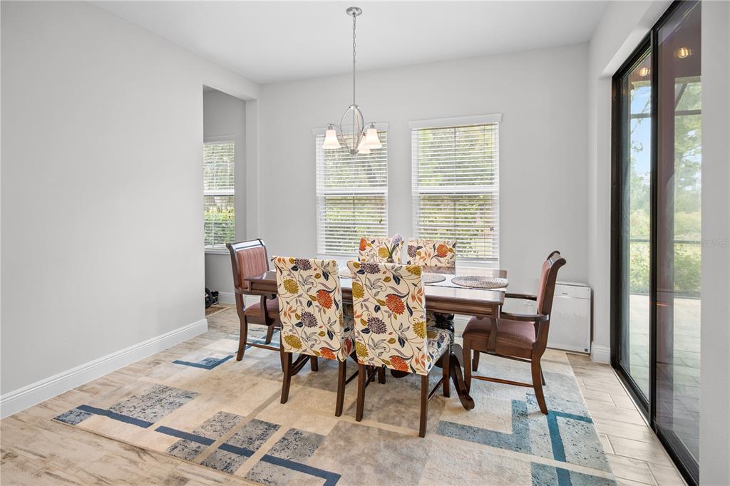 14654 Horse Trot Road Lithia, FL 33547 - Photo 12 of 53 a view of a dining room with furniture window and outside view