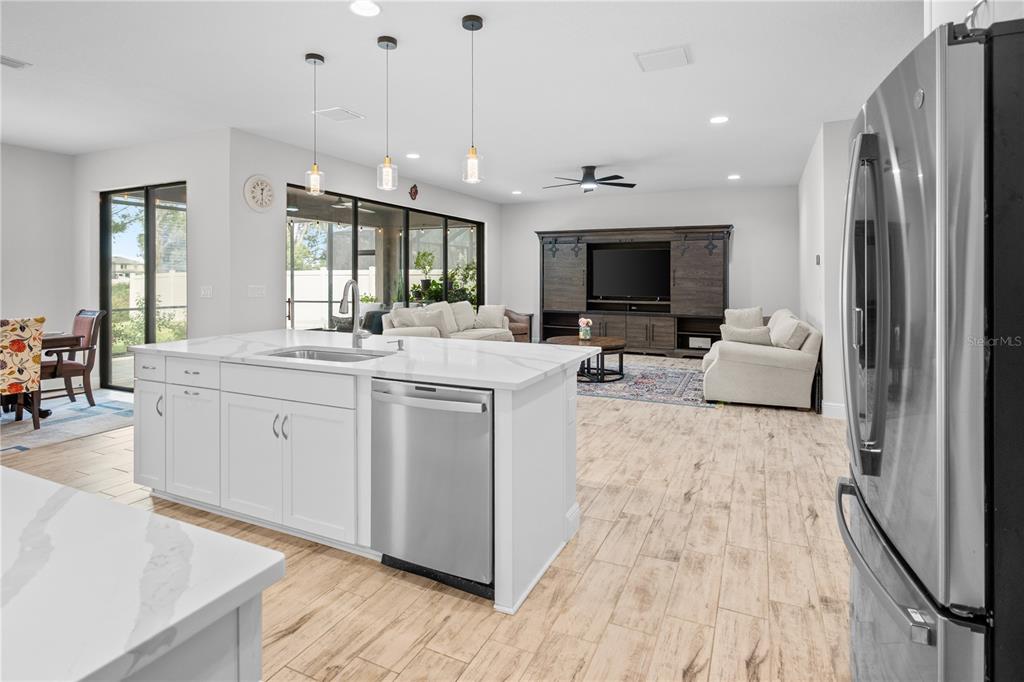 14654 Horse Trot Road Lithia, FL 33547 - Photo 17 of 53 a large white kitchen with a large window