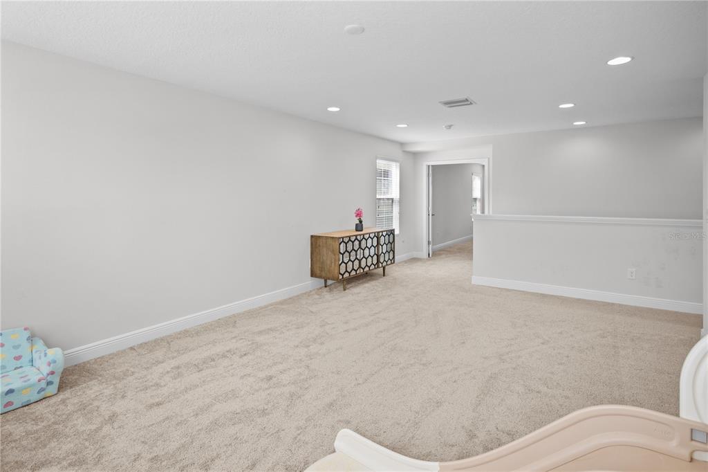 14654 Horse Trot Road Lithia, FL 33547 - Photo 20 of 53 a living room with furniture and a table