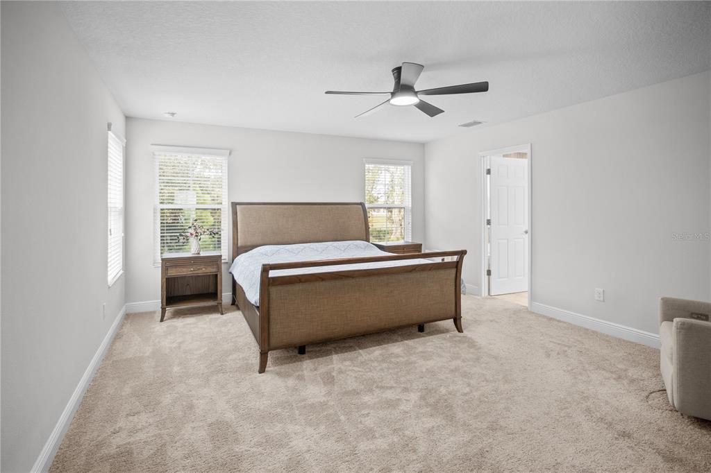 14654 Horse Trot Road Lithia, FL 33547 - Photo 30 of 53 a living room with a bed furniture and a window