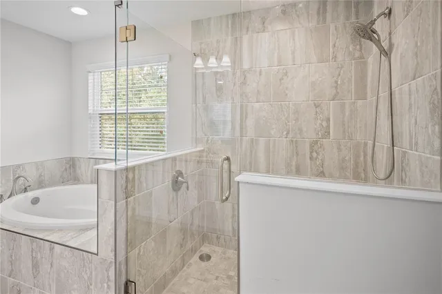 a building outdoor space with patio furniture and potted plants