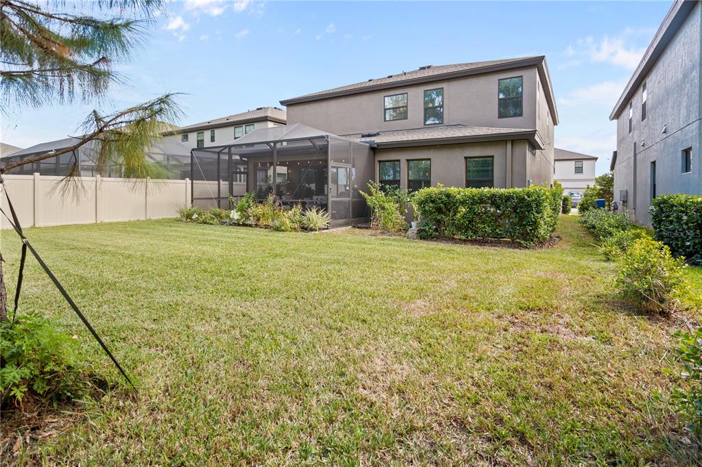 14654 Horse Trot Road Lithia, FL 33547 - Photo 37 of 53 a view of a house with a yard and sitting area